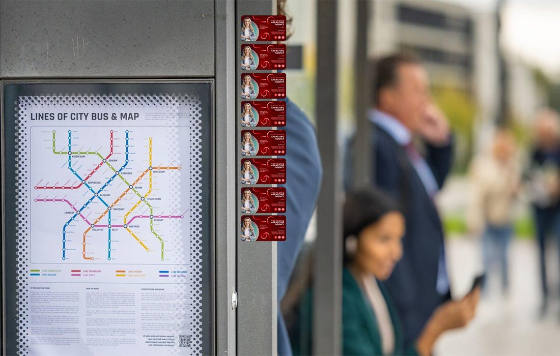 A bus stop showing the route map and promotional magnets surrounding the bus stop metal frame
