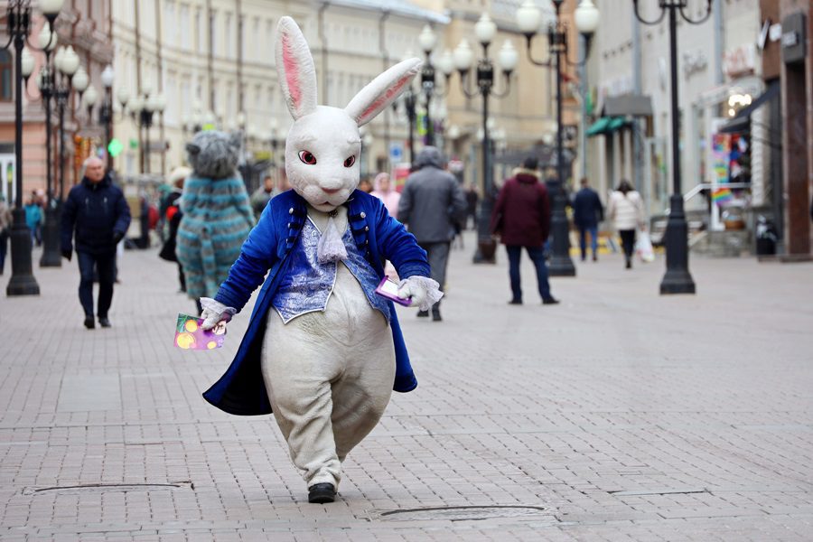 Person in Rabbit costume walking on a city street